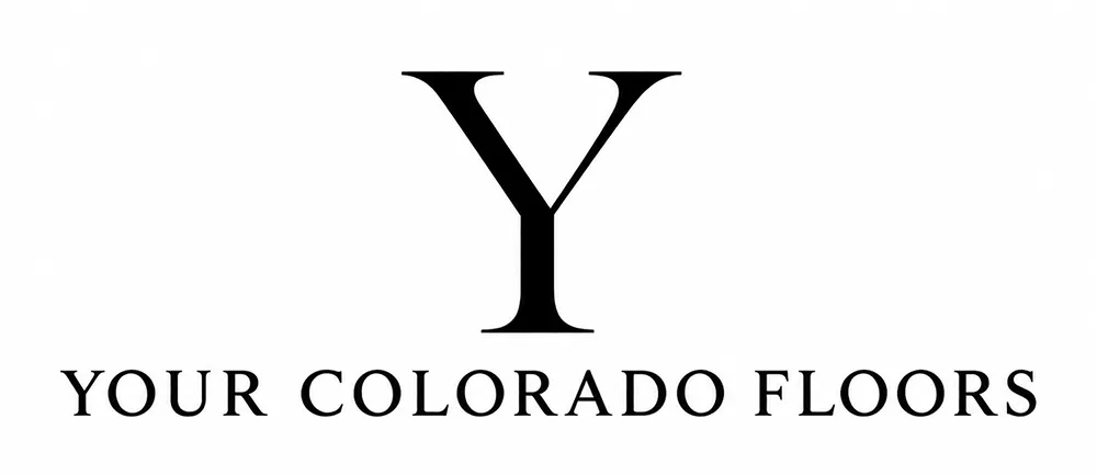 Logo featuring a large, bold letter "Y" above the text "YOUR COLORADO FLOORS" in uppercase black letters on a white background.