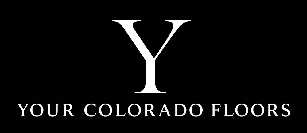 Logo featuring a large, bold letter "Y" above the text "YOUR COLORADO FLOORS" in uppercase white letters on a black background.